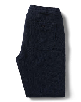 flatlay of the back of The Apres Pant in Navy Sashiko folded, Bottoms by Taylor Stitch