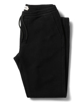 flatlay of The Apres Pant in Coal Waffle folded, Bottoms by Taylor Stitch