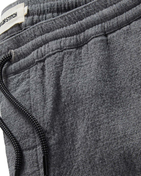 material shot of the drawstring and band on The Apres Pant in Heather Grey Double Cloth, Bottoms by Taylor Stitch