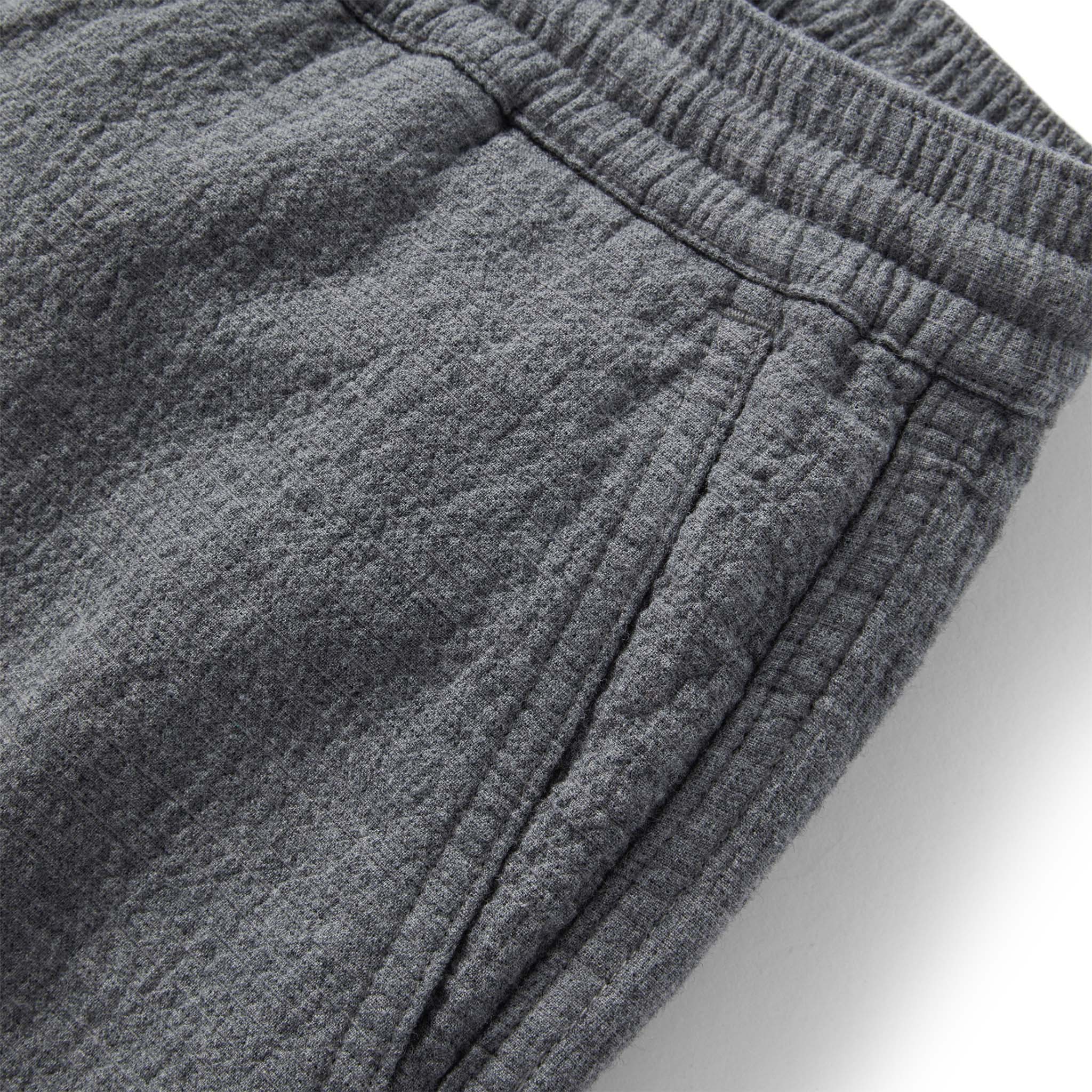 material shot of the pockets on The Apres Pant in Heather Grey Double Cloth, Bottoms by Taylor Stitch