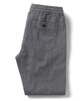 flatlay of the back of The Apres Pant in Heather Grey Double Cloth folded, Bottoms by Taylor Stitch