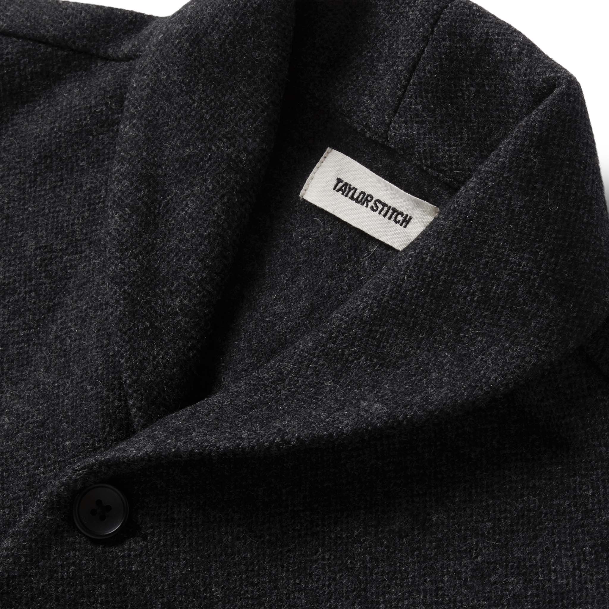 material shot of the collar on The Weekend Cardigan in Charcoal Herringbone Wool, Knits by Taylor Stitch