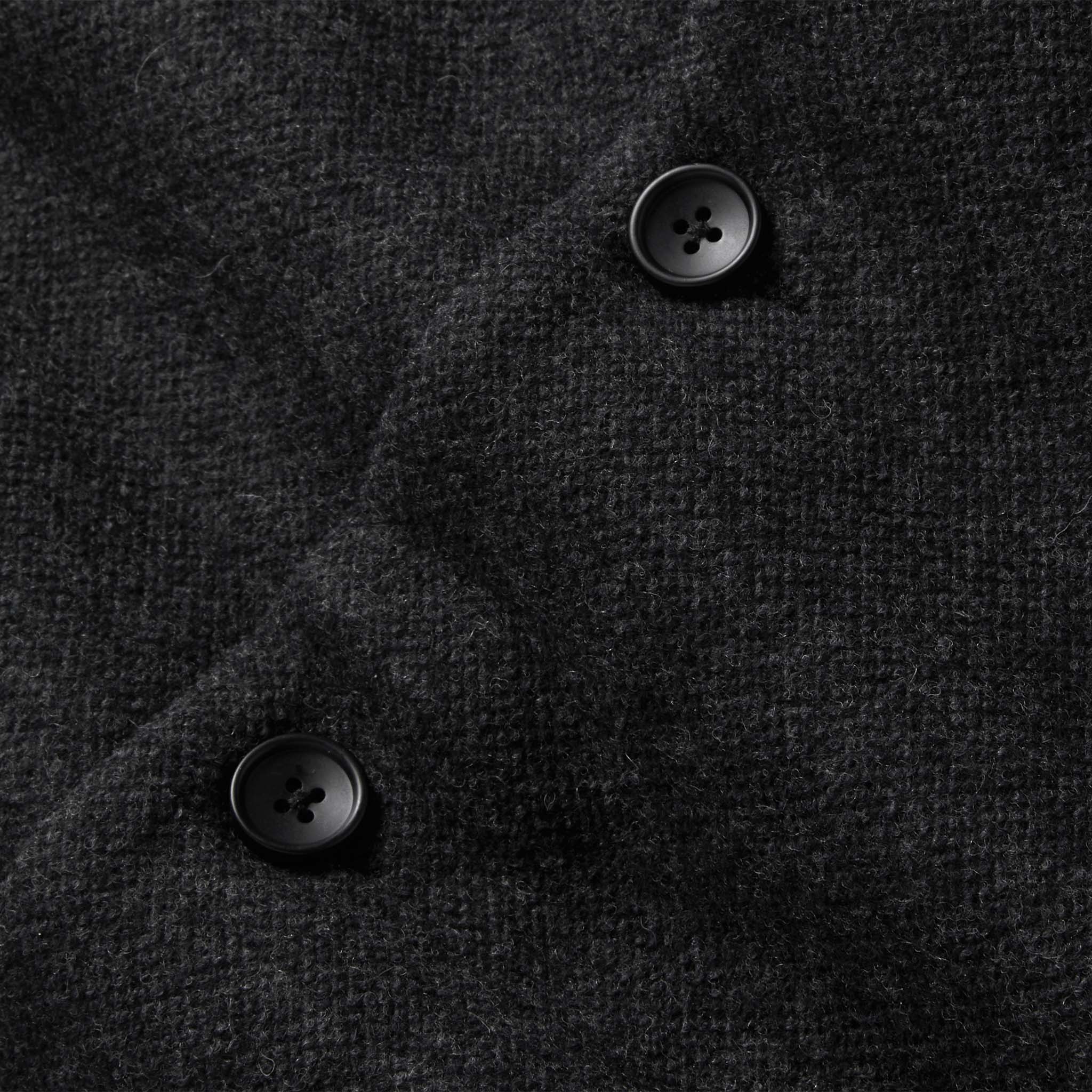 material shot of the buttons on The Weekend Cardigan in Charcoal Herringbone Wool, Knits by Taylor Stitch