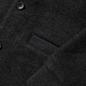 material shot of the pocket and sleeve on The Weekend Cardigan in Charcoal Herringbone Wool