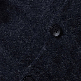 material shot of the buttons on The Weekend Cardigan in Navy Herringbone Wool