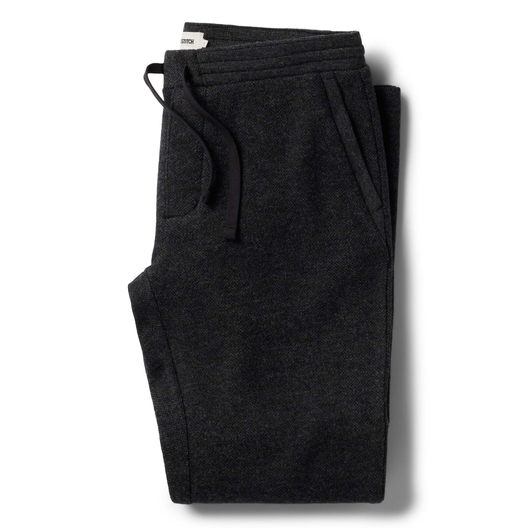 flatlay of The Weekend Pant in Charcoal Herringbone Wool folded, Bottoms by Taylor Stitch