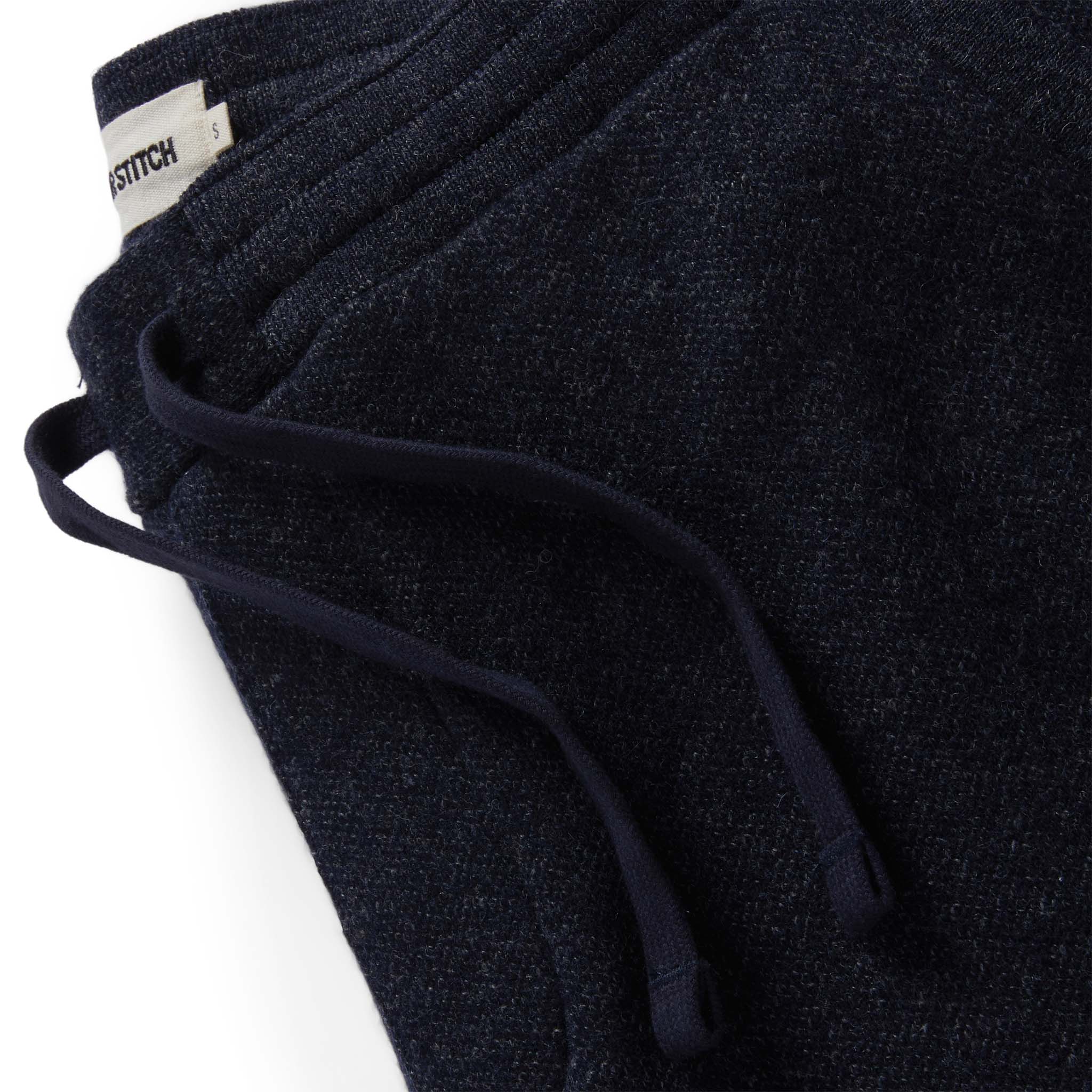material shot of the waistband on The Weekend Pant in Navy Herringbone Wool, Bottoms by Taylor Stitch