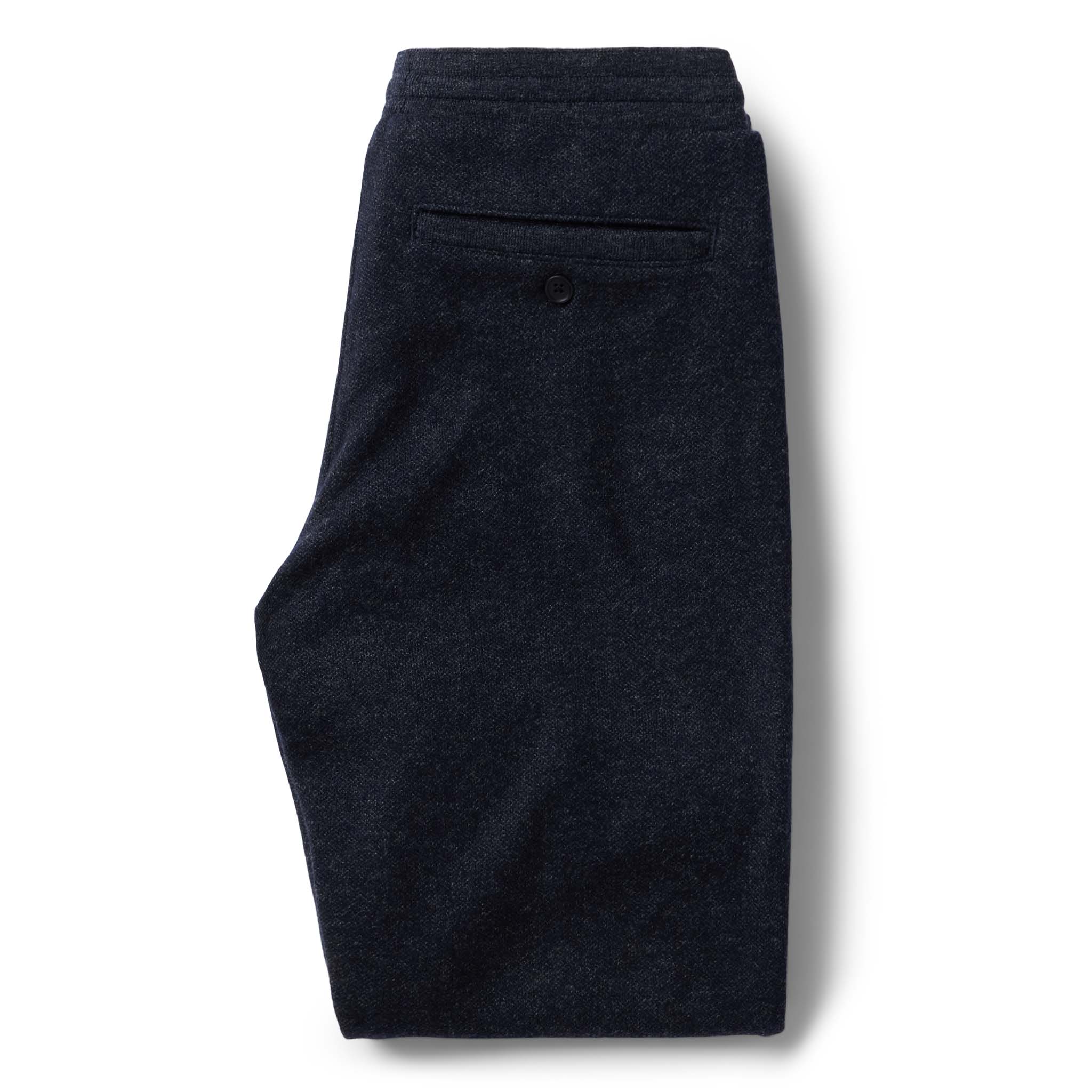 flatlay of the back of The Weekend Pant in Navy Herringbone Wool folded, Bottoms by Taylor Stitch