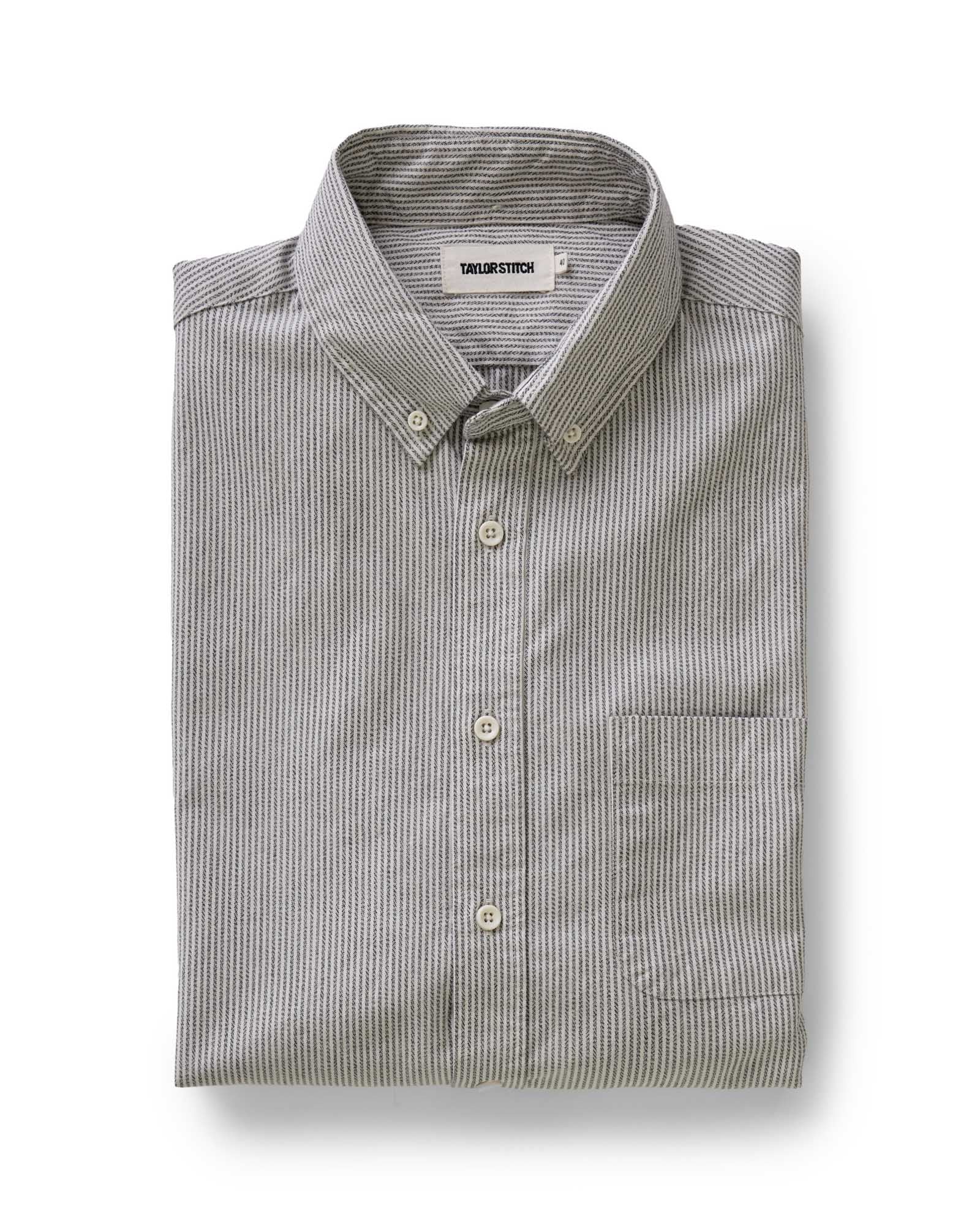 flatlay of The Jack in Coal Jaspe University Stripe Oxford folded, Wovens by Taylor Stitch