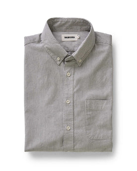 flatlay of The Jack in Coal Jaspe University Stripe Oxford folded, Wovens by Taylor Stitch