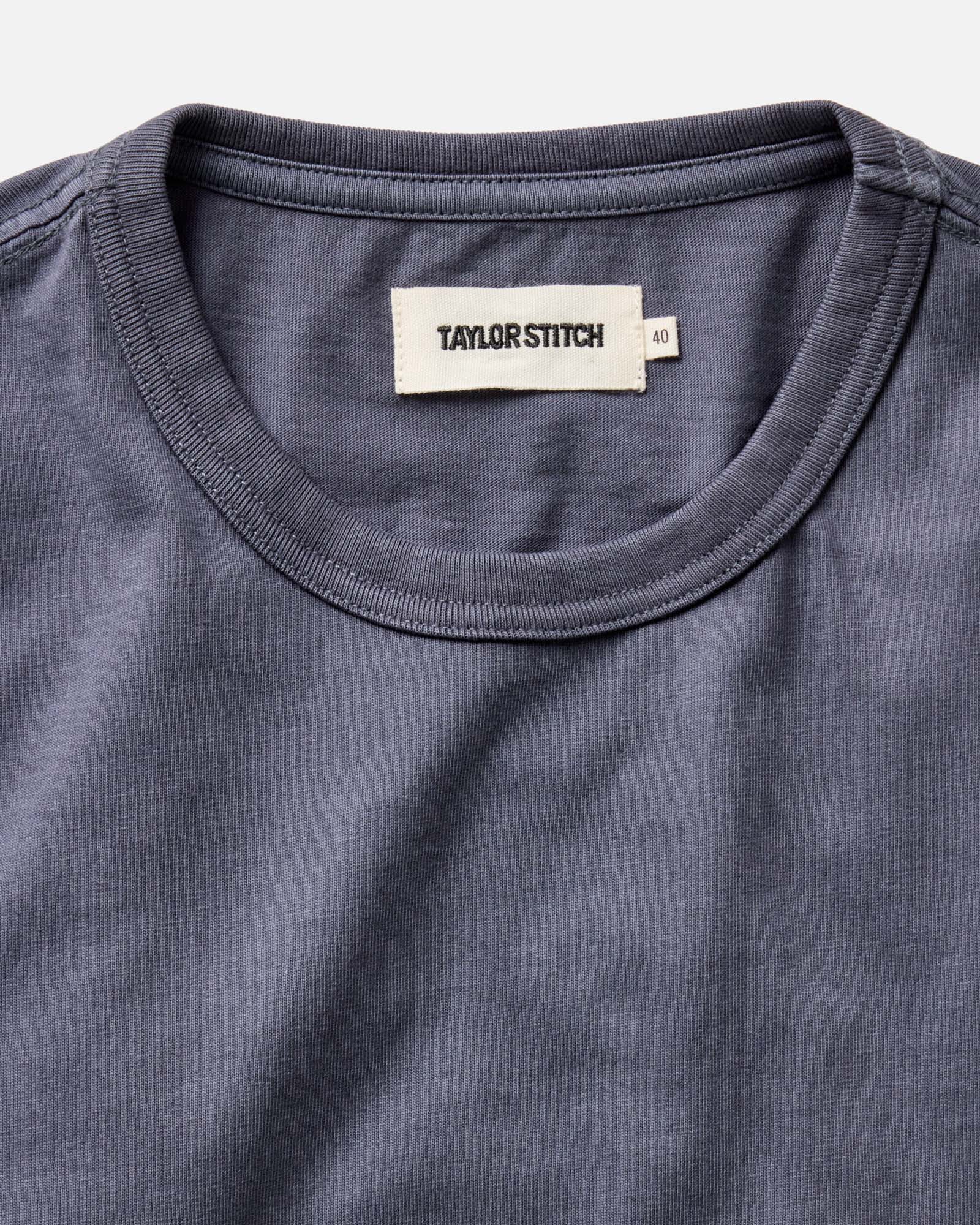 material shot of sleeve detail on The Organic Cotton Tee in Navy, Knits by Taylor Stitch