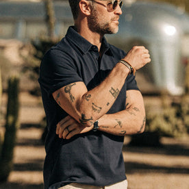 our fit model wearing The Heavy Bag Polo in Navy
