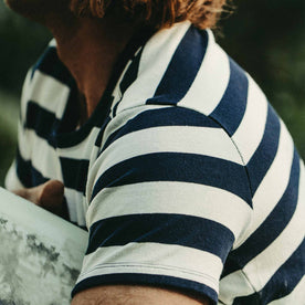 Our fit model wearing The Heavy Bag Tee in Natural & Navy Rugby Stripe by Taylor Stitch.