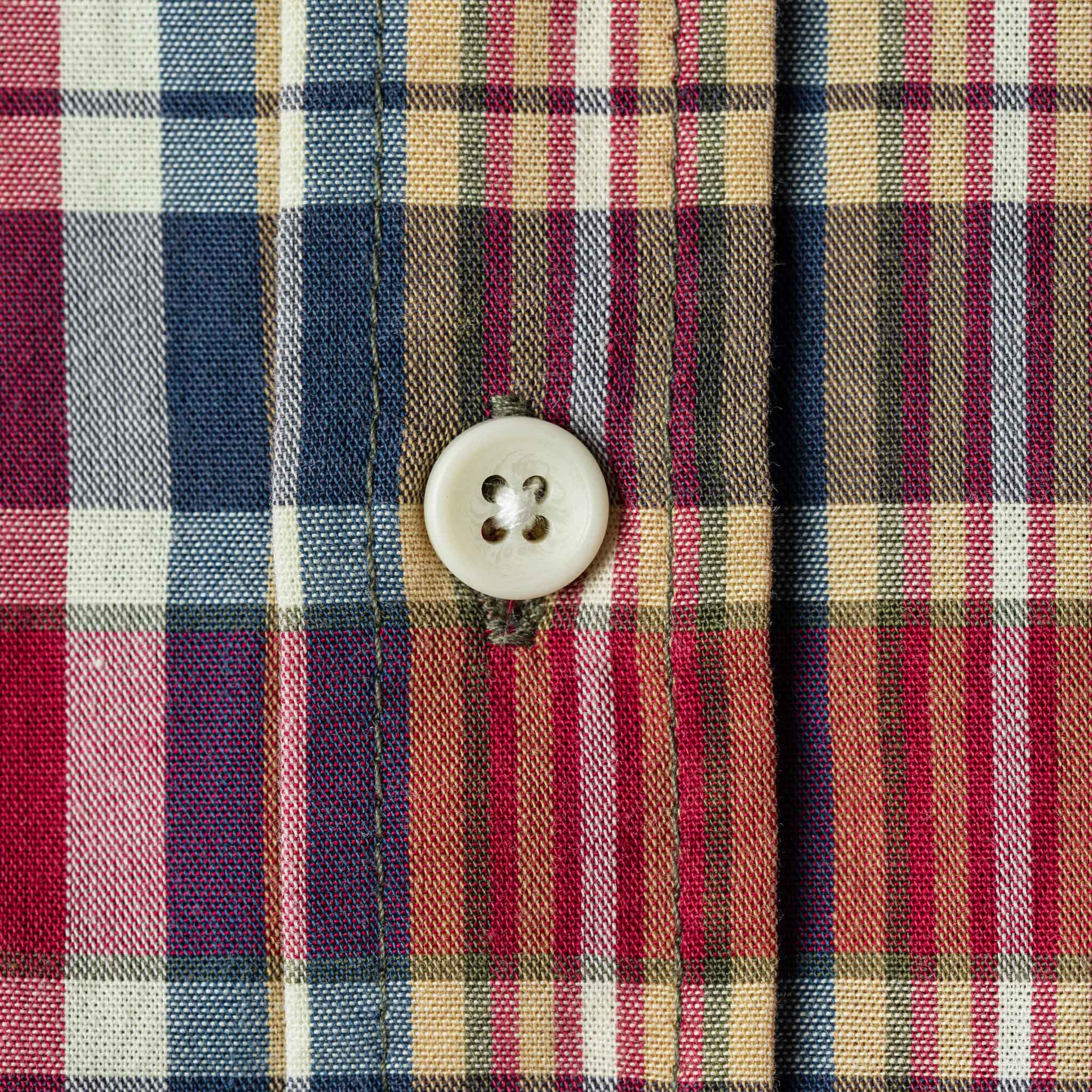 Close up material shot with perpendicular plaid and close up of button, Wovens by Taylor Stitch