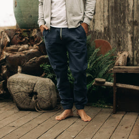 our fit model wearing The Après Pant in Navy Seersucker—cropped shot from chest down