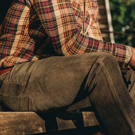 our fit model wearing The California in Vintage Navy Madras—cropped shot of chest down