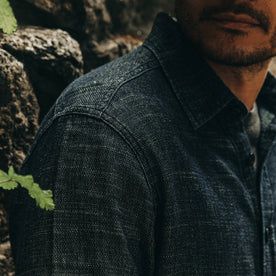 our fit model wearing The Cash Shirt in Indigo Hemp—cropped shot of right shoulder, close up