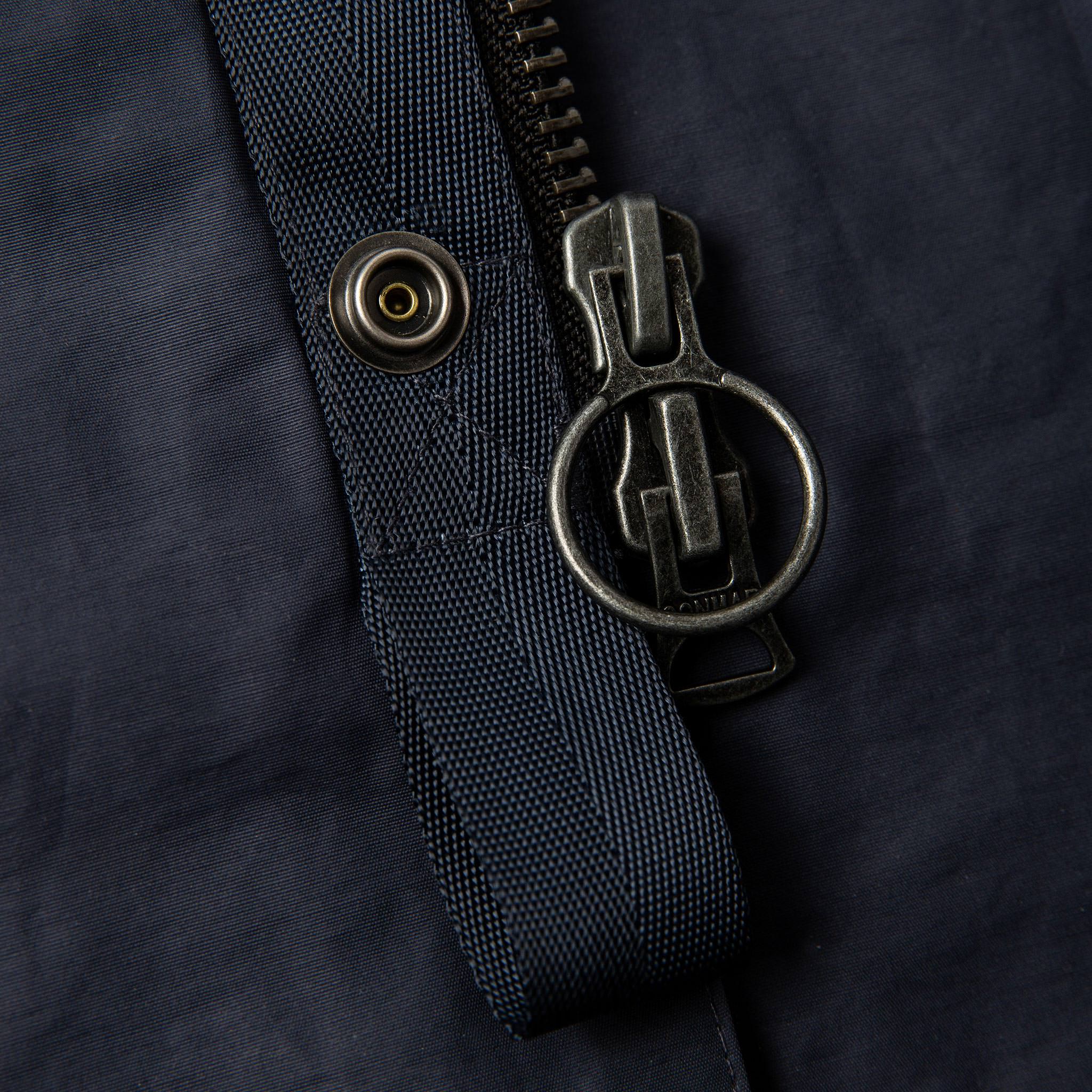 material shot of zipper and button, Outerwear by Taylor Stitch