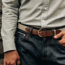fit model wearing The Democratic Jean in Organic Selvage, cropped waist shot