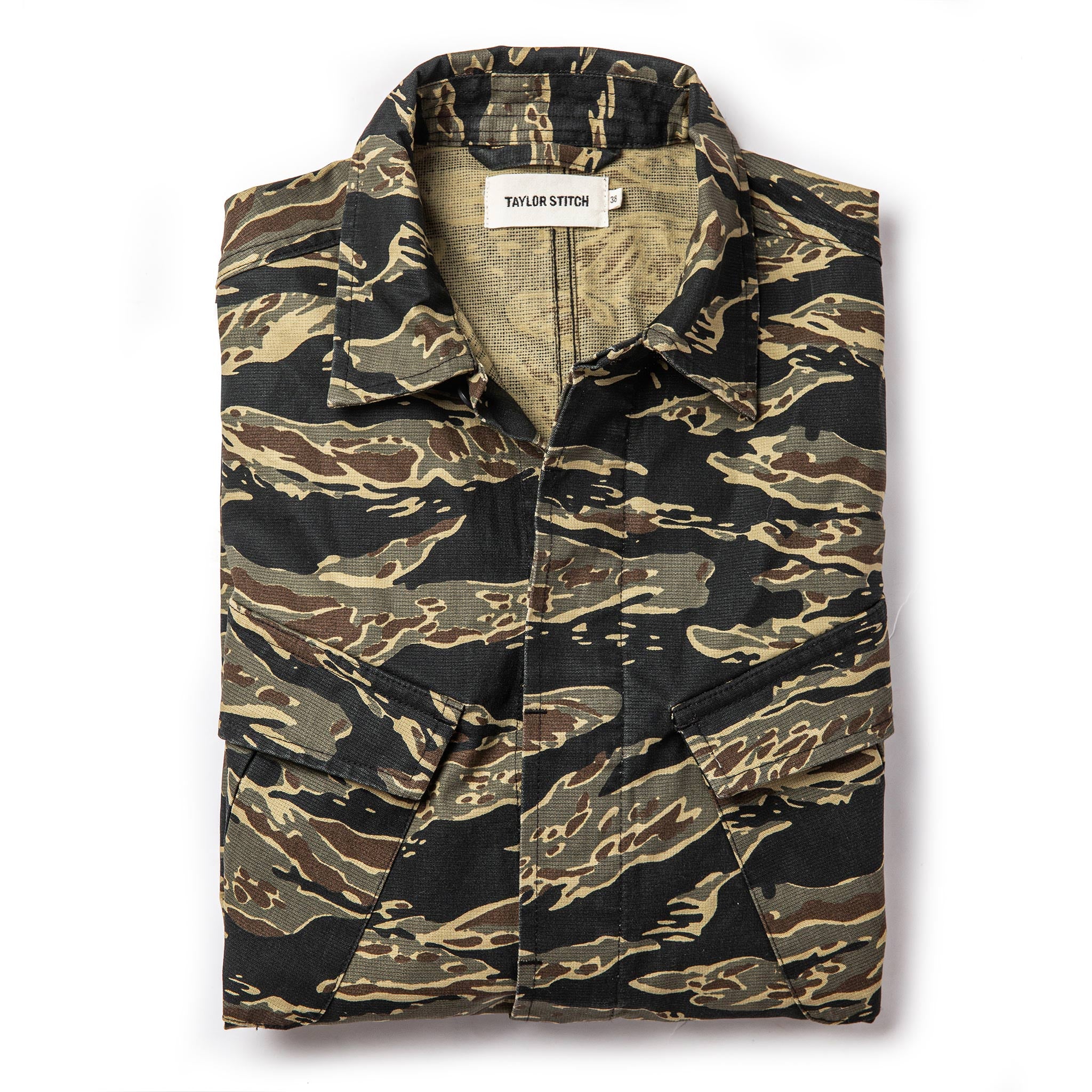 folded flatlay of The Jungle Shirt in Tiger Camo, Wovens by Taylor Stitch