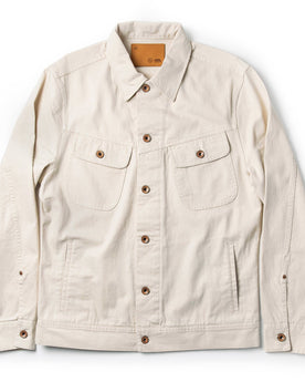 flatlay of The Long Haul Jacket in Natural Organic Selvage, Outerwear by Taylor Stitch
