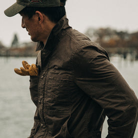 fit model wearing The Longshore Jacket in Dark Oak Waxed Canvas, cropped shot of side shoulder