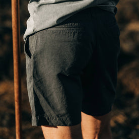 fit model wearing The Morse Short in Navy Slub Linen, back detail
