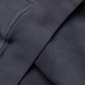 material shot of fabric detail on bottom of hoodie