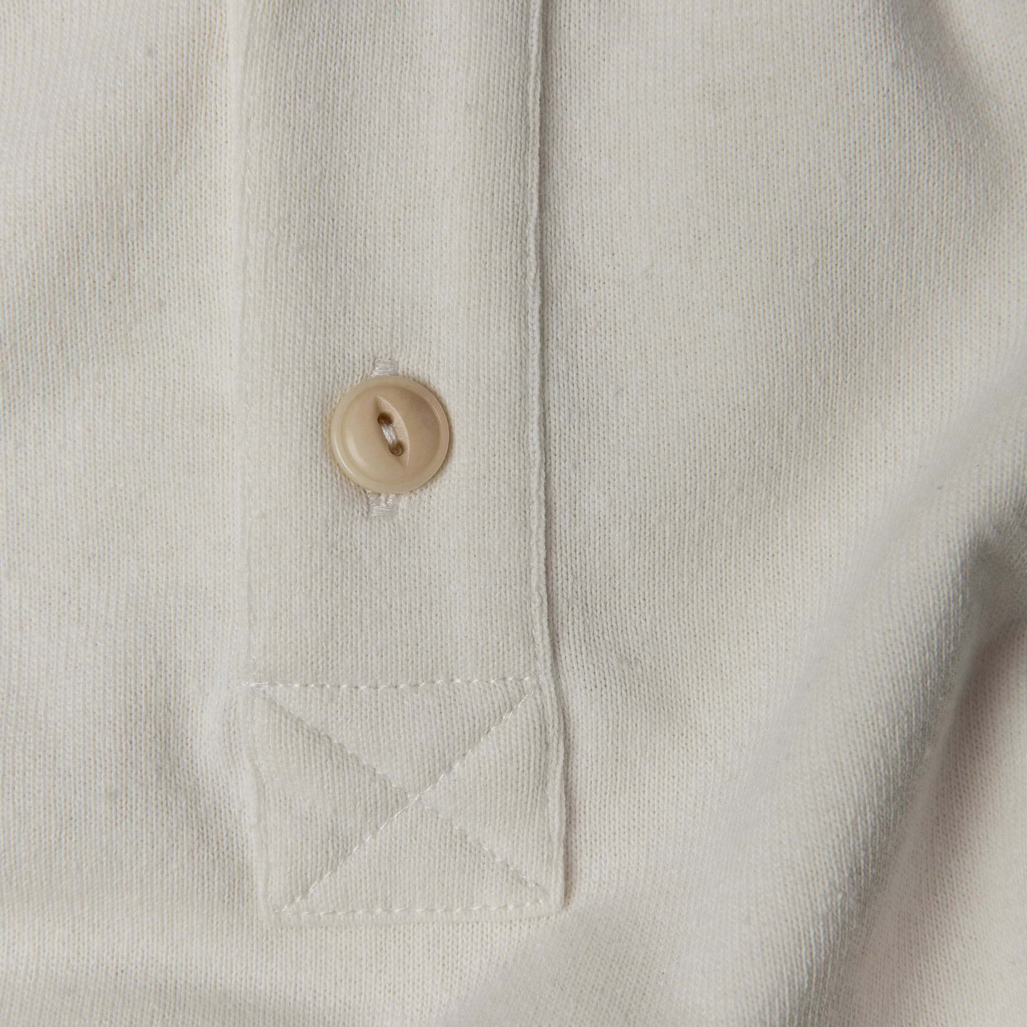 fabric shot of button, Knits by Taylor Stitch