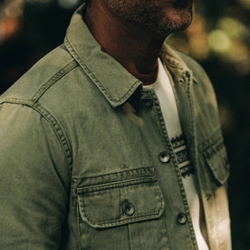 fit model wearing The HBT Jacket in Washed Olive, chest detail