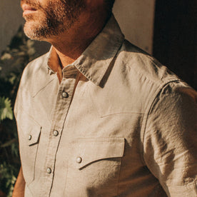 fit model wearing The Short Sleeve Western in Natural, chest detail