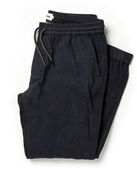 folded flatlay of The Après Pant in Coal Double Cloth, Bottoms by Taylor Stitch