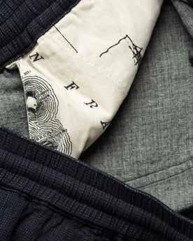 material shot of map pocket, Bottoms by Taylor Stitch