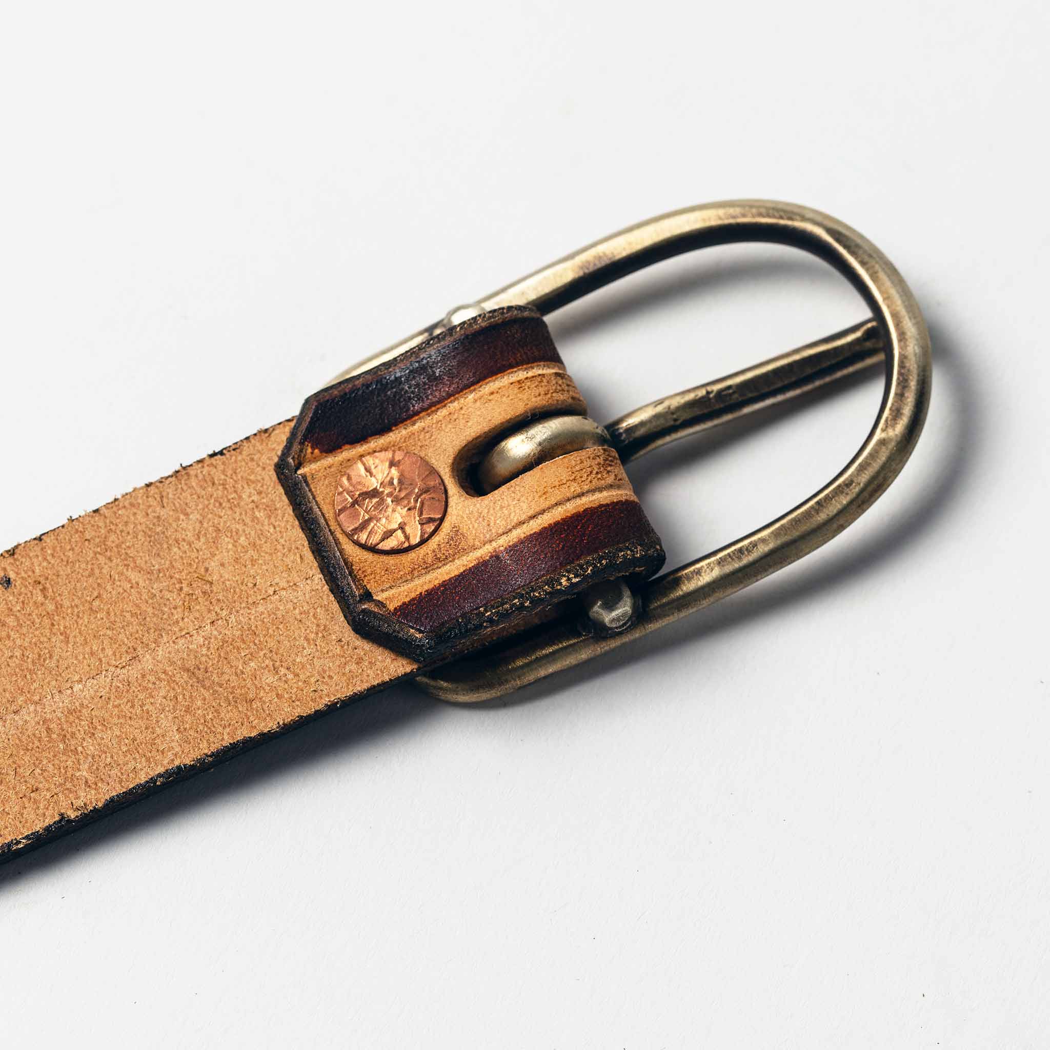 studio shot of The Stitched Belt in Cortado—buckle detail, Accessories by Taylor Stitch