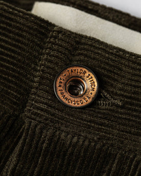 material shot of button, Bottoms by Taylor Stitch