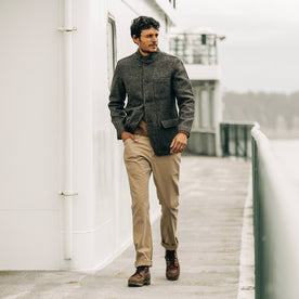 our fit model wearing The Camp Pant in Khaki Reverse Sateen—walking on a ferry