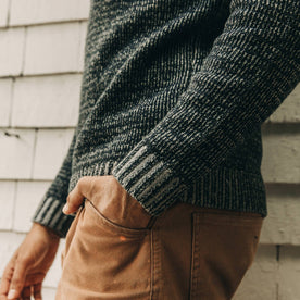 our fit model wearing The Headland Sweater in Marled Navy—cropped shot of hand in pocket