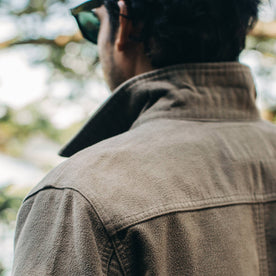 our fit model wearing The Long Haul Jacket in Moss Brushed Reverse Sateen—back material detail shot
