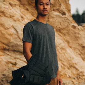 our fit model wearing The Merino Tee—in our navy colorway on the coast