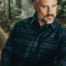 our fit model wearing The Yosemite Shirt in Blackwatch Plaid—cropped shot of chest