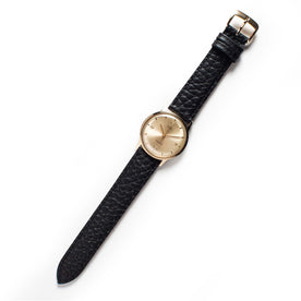 flatlay of The 1965 Timex Electric, Accessories by Taylor Stitch