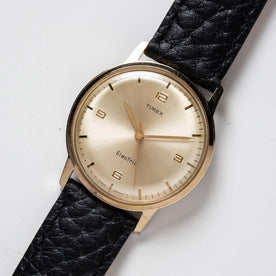 material shot of the watchface of The 1965 Timex Electric, Accessories by Taylor Stitch