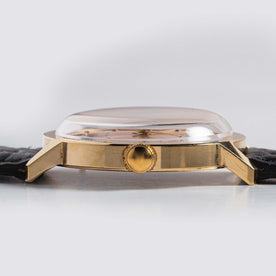 material shot of the side of The 1972 Timex Marlin Gold, Accessories by Taylor Stitch