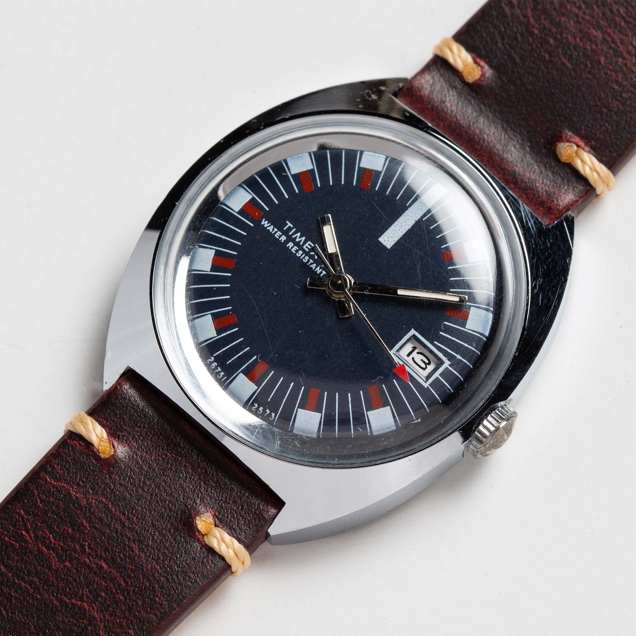 material shot of the watchface on The 1973 Timex Marlin, Accessories by Taylor Stitch