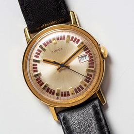 material shot of the watchface on The 1974 Timex Mercury Calendar Gold