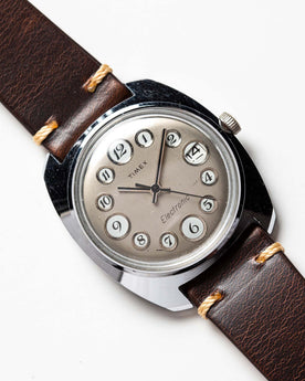 material shot of the watchface on The 1974 Timex Electronic "Rotary" Calendar, Accessories by Taylor Stitch