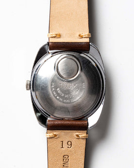 material shot of the back of The 1974 Timex Electronic "Rotary" Calendar, Accessories by Taylor Stitch