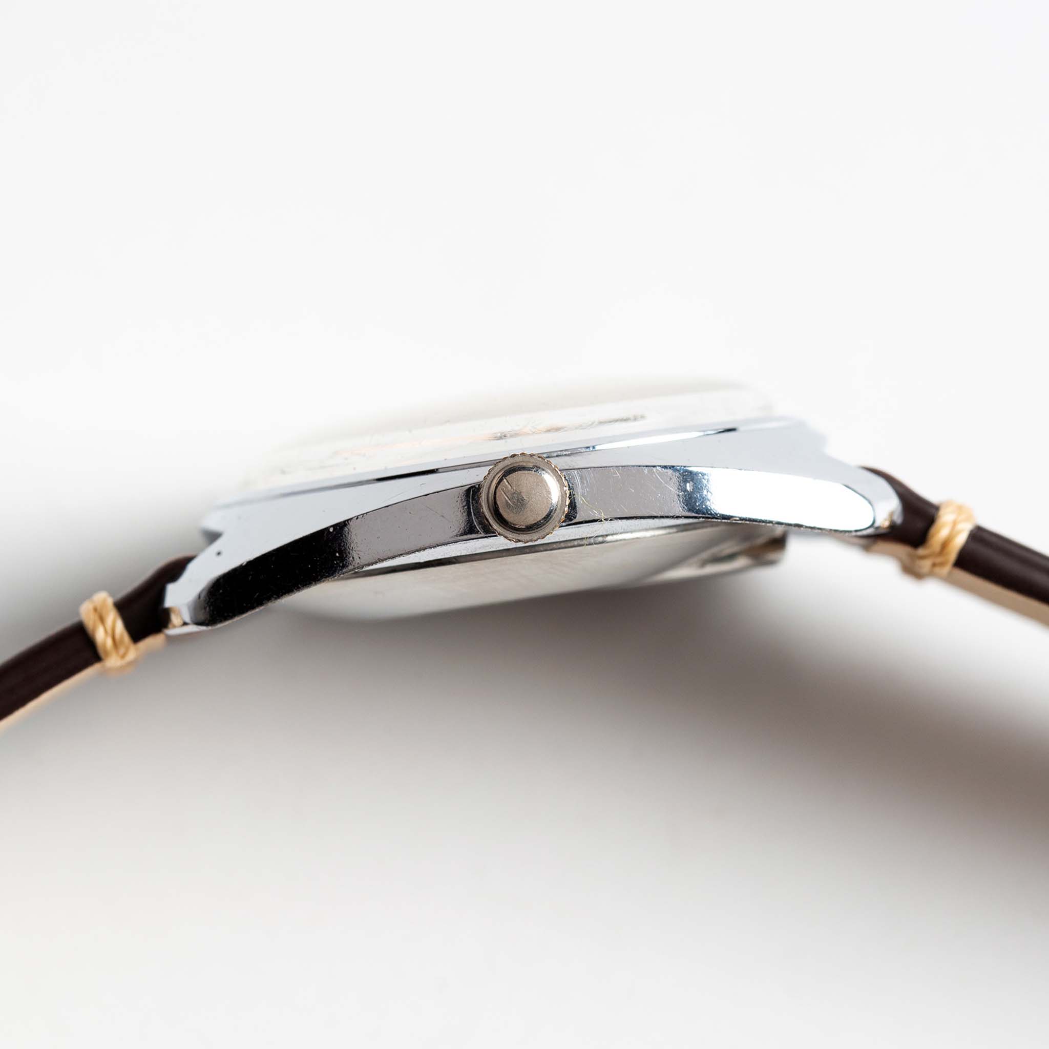 material shot of the side of The 1974 Timex Electronic "Rotary" Calendar, Accessories by Taylor Stitch