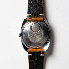 flatlay of 1976 Timex Electric Dynabeat, shown from the back