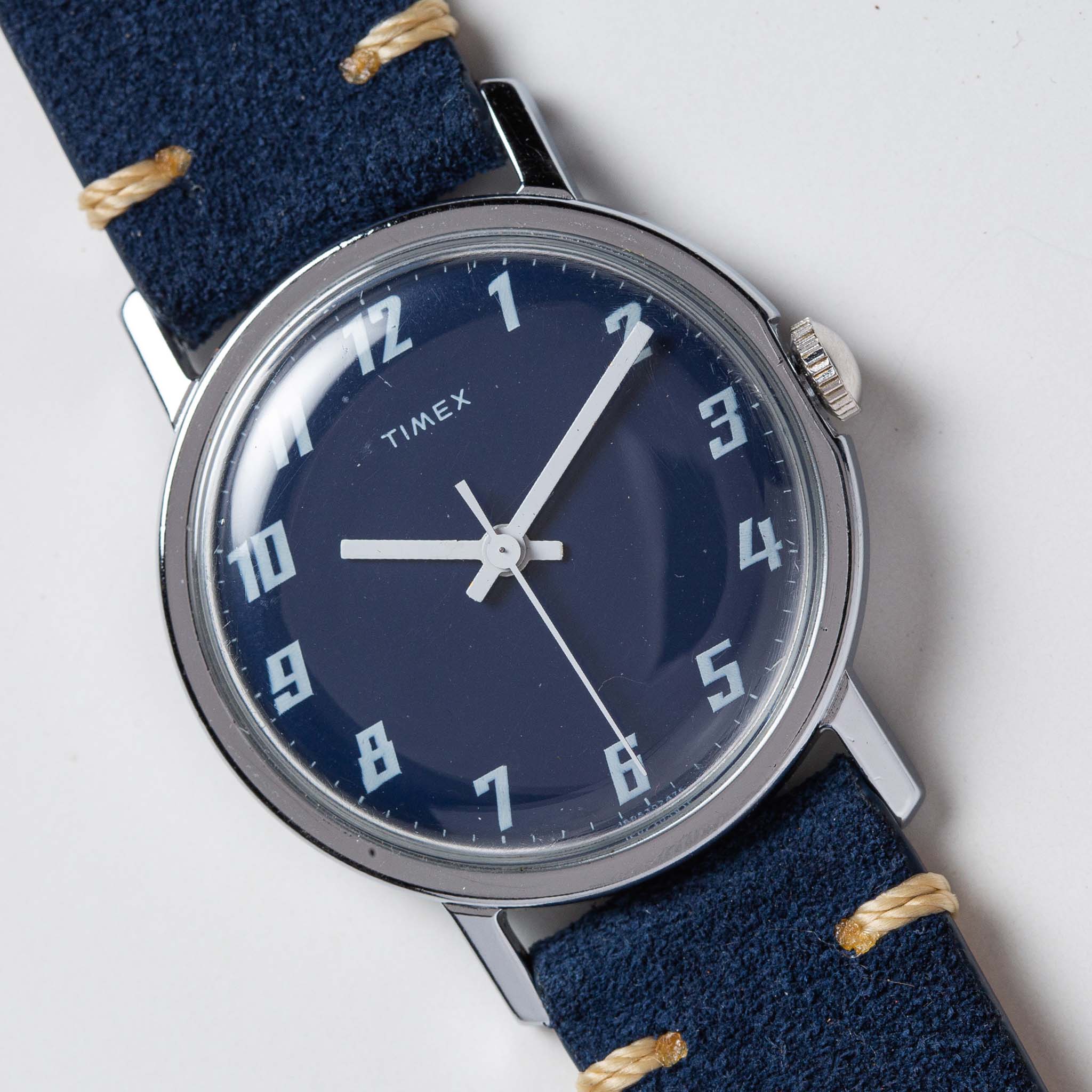 flatlay of 1976 Timex Mercury Blue, shown close up, Accessories by Taylor Stitch